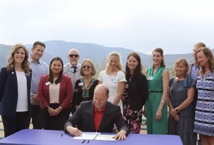 Jared Polis stops in Edwards, EagleVail to sign bills addressing housing and behavioral health